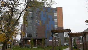 London woman recounts her brush with homelessness at the opening of a new community housing project