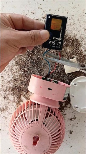 Old mini fan not working | Disassembled and found a 3.7V mobile phone battery installed.