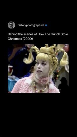 The production of the 2000 live-action film How the Grinch Stole Christmas involved extensive practical effects and grand, whimsical sets. Lead actor Jim Carrey famously endured hours of daily makeup application, needing help from a "torture expert" to cope with the physical discomfort of the process. Credit: Universal Pictures | History In Pictures