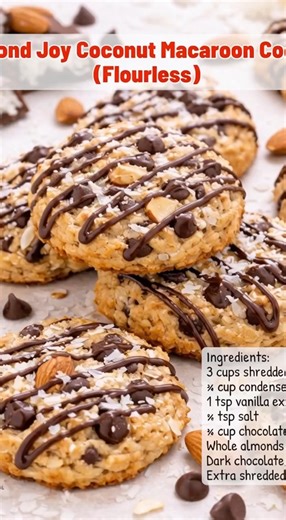 🥥 Almond Joy Coconut Macaroon Cookies (Flourless) Ingredients 3 cups sweetened shredded coconut ¾ cup sweetened condensed milk 1 tsp vanilla extract ¼ tsp salt ¾ cup chocolate chips Whole almonds (one per cookie) Dark chocolate, melted for drizzle Extra shredded coconut Instructions 1. Preheat oven to 325°F (165°C). 2. Mix coconut, condensed milk, vanilla, salt, and chocolate chips. 3. Scoop mounds onto lined baking sheet, lightly flatten. 4. Press an extra chocolate chips and almond into each 