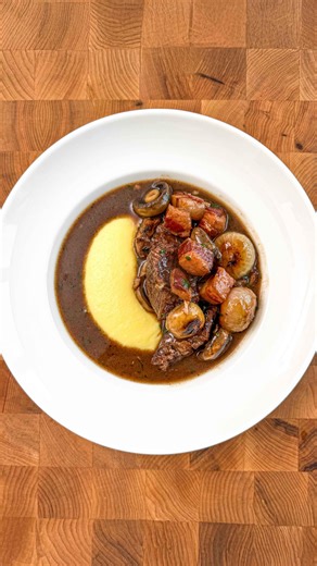 Boeuf bourguignon 🥩 (6 portions) 1 Beef short rib (aka Jacobs ladder, 4 bone) 200g Pancetta (Ventreche) 750ml Red wine (full bodied) 200ml Beef stock 2 Carrots 2 Celery (stick) 1 Onion ½ Garlic (bulb) 1 Bouquet garni 2 tbsp Flour Salt pepper - 10g Parsley (chopped) 100g Baby onions 100g Champignon de Paris - Remove the bones from the short rib and cut into large, 1 inch dice. Pour the red wine into a large bowl and add the beef, lardons, bouquet, onion, celery and carrot. Leave to marinate over