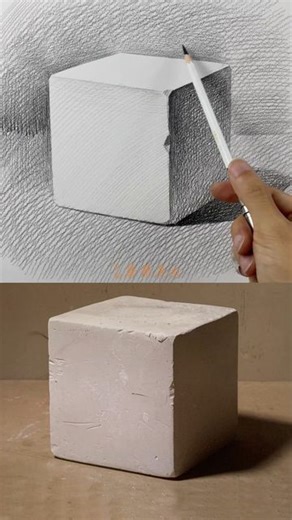 Graphite Drawing Art Gallery on Instagram: "From sketch to reality: This side-by-side comparison showcases the transition from a simple pencil drawing to a three-dimensional form. The precise shading in the sketch effectively captures the play of light and shadow, bringing the cube to life even before it takes on its tangible form drawing by Cai Jian Art #graphitedrawing #graphitedrawings #pencildrawing #pencilsketch #pencil #pencilart #pencilsketches #pencilartist #pencildraw #pencilartwork #pe