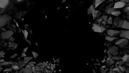 Explosions and destruction in the middle of a concrete wall. Falling...