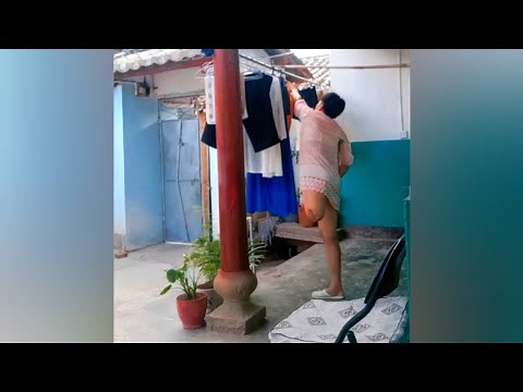 Amputee Lady House Work With Under Arm Crutches | Amputada