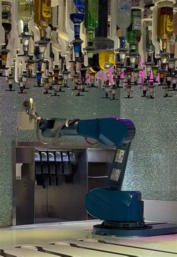 Shake Shake Shake 🤖🍸🍹 The Bionic Bar!! The robot cocktail bar on Royal Caribbean's Quantum of the Seas is powered by Makr Shakr and this venue features two robotic arms that shake, stir, and muddle custom cocktails, which guests order via tablets. It is located on Deck 5 of the ship and draws quite a crowd. Also: he’s actually a bit of a messy goofball bartender robot so he’s really fun to watch (and there is a real human bar backer there to help when he forgets to fill your drink to the top 