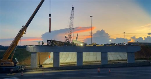 Beams set on new bridge over Alcoa Highway