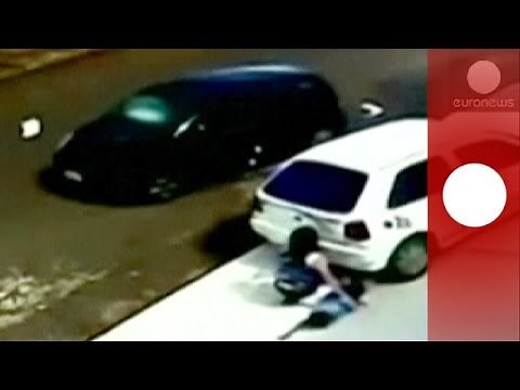 Shocking CCTV: Miracle escape for kid and grandmother run over by car