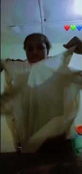 Prisy ripping her T shirt