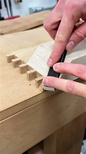 Chiseling a precise dovetail joint for a perfect and clean wood connection