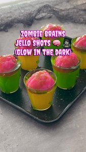 Johany Torres | Las Vegas Creator on Instagram: "🧠🧟‍♀️ Zombie Brain Jello Shots (glow under black light) all products I used can be found in the link in my bio! Recipe👇🏼 🧠3oz box lemon Jello 🧠Neon yellow food dust (link in bio) 🧠Periodt green edible glitter Fancy Sprinkles (glows under black light) 🧠1 cup boiling water 🧠 1 cup alcohol of choice (non alcoholic use 1 cup cold water) 🧠 Brain Mold from Michaels 🧠 Mini jello shot cups from Dollar Tree 🧠 Edible slime from Wilton 🧠 Strawbe