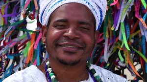 Portrait of Candomble priest Woman at Bonfim Church in Salvador, Bahia, Brazil