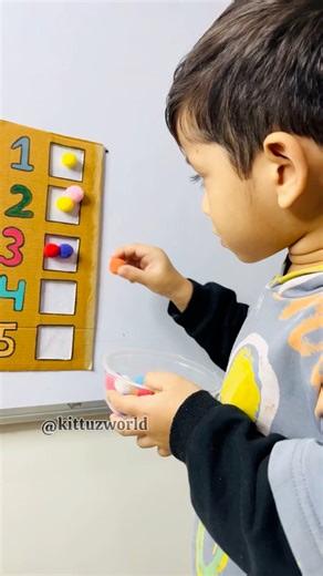 🎯 Fun Counting & Number Recognition Activity for kids! 🧮✨ Using colorful pom-poms to match numbers makes learning engaging and hands-on. 🌈 Perfect for preschoolers and toddlers. 💛#CountingActivity #PreschoolLearning #NumberRecognition #ToddlerActivities #MontessoriAtHome #KidsLearningFun #HandsOnLearning #EarlyMathSkills #HomeschoolingKids #kittuzworld | Renu Bala