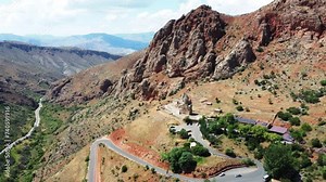 Noravank monastery in Armenia. Famous tourist destination in Armenia. Ancient monastery located in mountains, in rocky area, aerial view.