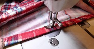Sewing a straight seam on tartan fabric using a sewing machine