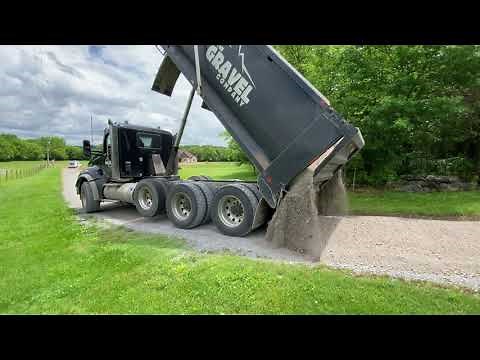 Kenworth t880 Dump Truck Spreading Crusher Run Gravel