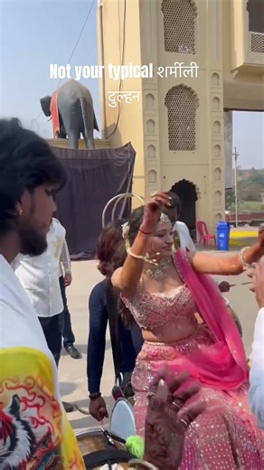 Indian bride goes wild on dhol😌#dhol #maincharacterenergy #ytshorts
