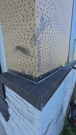 Corner metal flashing over Versetta Stone prior to installing @lp_pros Smartside Expert Finish! Make sure to flash over all stone products before installing!! | RR Buildings
