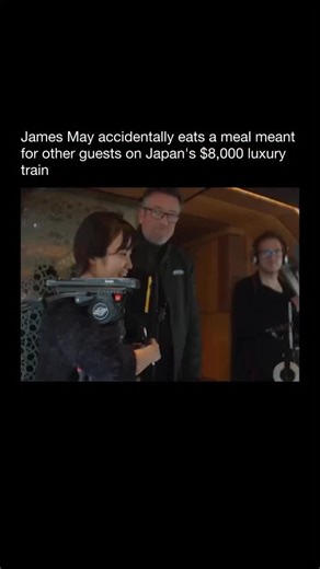 Purely History on Instagram: "In 2020, James May took a ride on Japan’s high end Shiki Shima train, a trip known for its refined food and beautifully designed cabins. At one point he picked up a dish that was actually prepared for a group being filmed nearby. He started eating without realizing it was not his meal, then quickly apologized to the chef once the mix up became clear. The moment spread widely online because it captured his easygoing personality and his natural sense of humor. The Shi