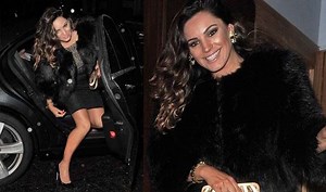 A golden glow! Bronzed Kelly Brook flaunts her tanned pins in tiny met