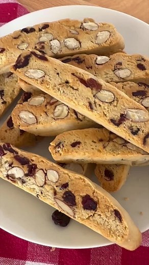 Cranberry Almond Biscotti are an Italian dessert cookie with lots of crunch and flavor! 🇮🇹 Recipe at: https://thisitaliankitchen.com/cranberry-almond-biscotti/ #cranberryalmondbiscotti #cantucci
