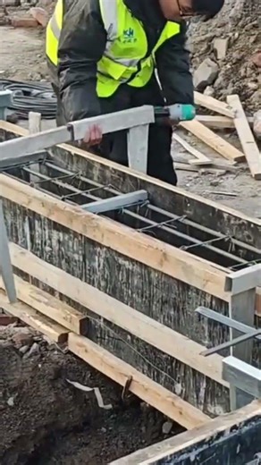 The process of installing an iron rod in the construction area using special tools
