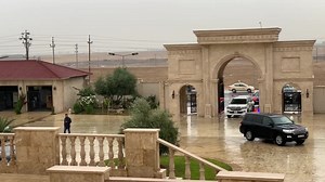 Exploring a Suburban Area with Historic Stone Gateway