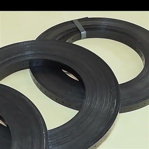 the machine for making perforated steel straps