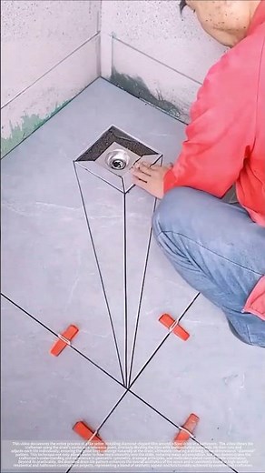 Three-dimensional "diamond" shaped floor drain tile installation technique.