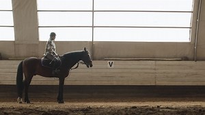 Free stock video - Side view of woman riding a horse