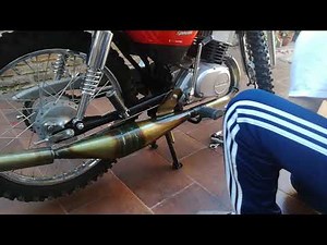 Escape artesanal suzuki ax100