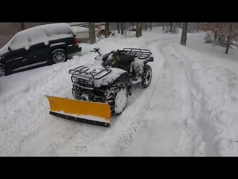 Plowing snow on a Honda fourtrax 300 atv