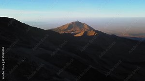 Aerial of the beautiful pico de orizaba volcano with a view of the Large Millimeter Telescope