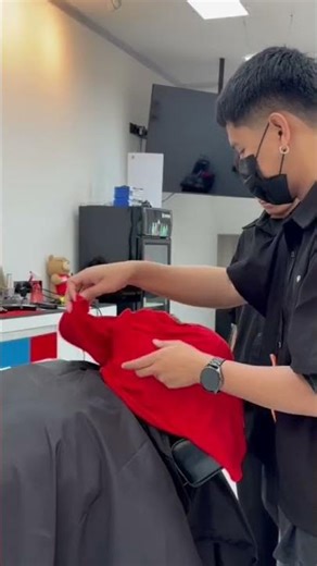 Haircut and beard trimming service using cool towels.