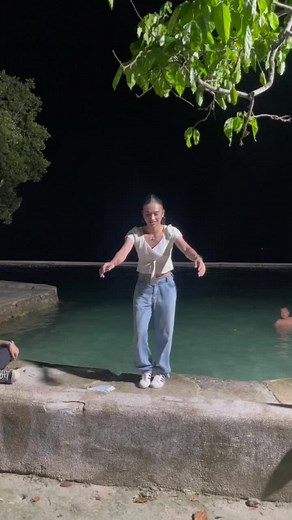 Energetic Nighttime Poolside Dance Performance