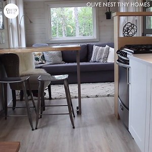 Wait until you see what's attached to this tiny home. Read more: http://ctrylv.co/kP334Xo | Country Living Magazine