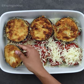 42K views · 1.2K reactions | Eggplant Parmesan also called Eggplant Parmigiana is a rich, and classic Italian dish. It is usually made with breaded eggplant, marinara sauce, fresh mozzarella, and parmesan cheese. It is the vegetarian version of the popular and classic Chicken Parmesan Recipe. This Eggplant Parmesan is one of the best dishes and tastes great on its own or along with pasta dishes that can be served for lunch and dinner. | Yellow Chili's | Facebook