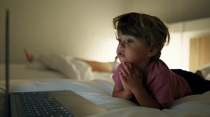Child Watching Entertainment Media On Laptop Stock Footage Video (100% Royalty-free) 1100343561 | Shutterstock