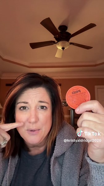 Exploring a Unique Orange Object in a Cozy Setting