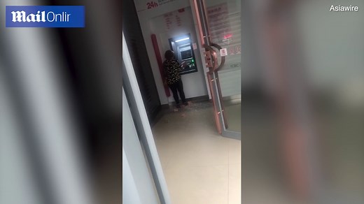 Woman smashes ATM with a brick after being refused cash withdrawal
