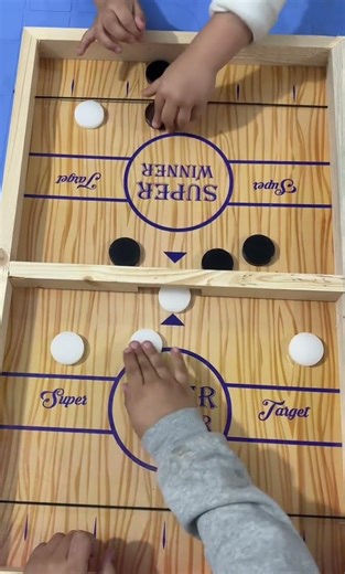 Super winner 👍 whoever clear the board first wins 👌sling puck game #shorts #pucketgame #boardgames