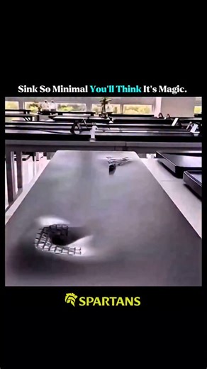 Fact Bull on Instagram: "The minimalist concrete sinks in Kim Kardashian's home are seamless and have a nearly invisible, rectangular slit for a drain. The surface is not flat but has a very gradual slope, directing water to flow into the narrow drain without splashing or pooling. This design, developed with architect Claudio Silvestrin and others, is part of the home's overall minimalistic aesthetic and required eight prototypes to perfect."