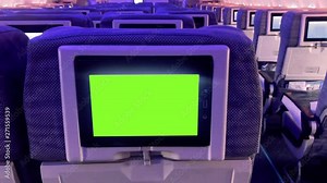 Green Screen in the Aircraft Cabin. Zoom In. You can Replace Green Screen with the Footage or Picture you Want with “Keying” Effect (Check out Tutorials in Internet).