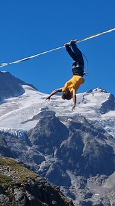 Rate this trick form 1-10 🔥 🔎 - Fat Graphic Tee Men Citrus/Anthracite 🔎 - Nordwand Pro Trousers Men Petrol #natureisourplayground #outdooradventures #slackline #highline #balance #acrobatics #slacklinewithaview #view #adrenaline @samuelvolery | RevolutionRace