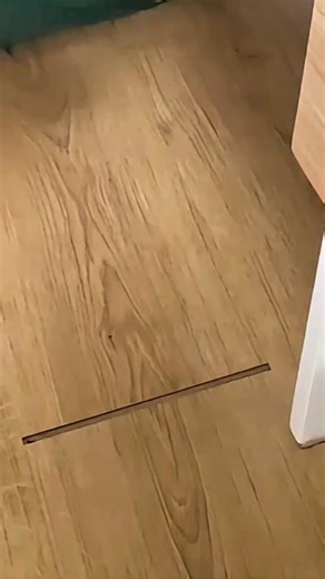 DIY & Home Renovation | KT on Instagram: "How to repair your flooring. The tongue and groove floor joint had come away from its original position. This will save you having to take up the entire floor to fix the hole. I'm using items I already had at home: Stuck painters tape to the wooden floor and a scrap piece of wood - ensuring no gaps are present. Applied super glue to floor tape - make sure it doesn't go near the edges. Placed the scrap wood on top and applied pressure. Once stuck together