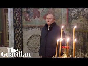 Putin attends Orthodox Christmas service alone