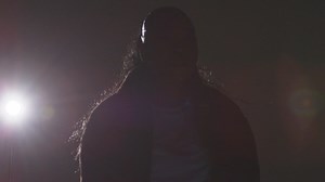 Backlit Studio Shot Of Young Woman Dancer Dancing In Front Of Spotlight | Free Stock Video Footage