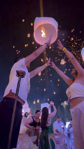 Couple Releases Sky Lantern Into a Sea of Glowing Lights