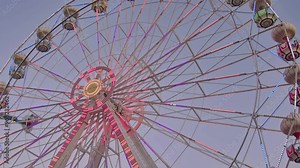 The Spinning Ferris Wheel at the Amusement Park One Evening Footage.