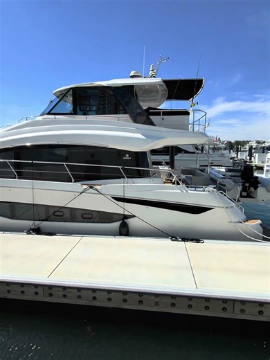 Aquila 54 Catamaran – Enclosed Skybridge Lounge Review | YachtBuying101.com