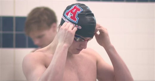 Arrowhead's Lance Johnson swims to make state history